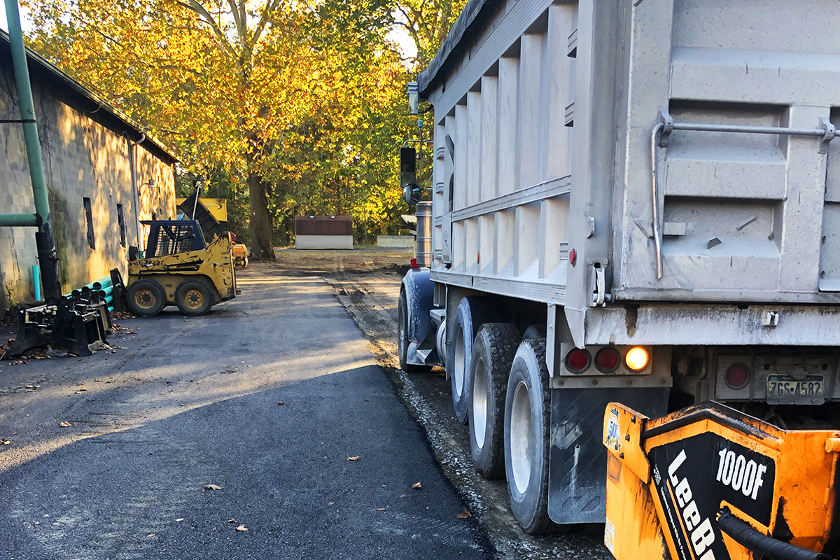 Dump truck hauling material on a job site